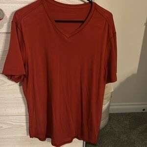 Lululemon burnt orange men’s t shirt. New without tags!